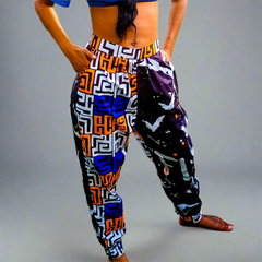 High-waist Jodhpur style pant with a black, orange, white & blue kuba-style print and abstract birds with the word FLY on the other side.